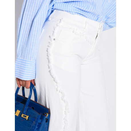 Jeans coupe large taille moyenne à coutures effilochées