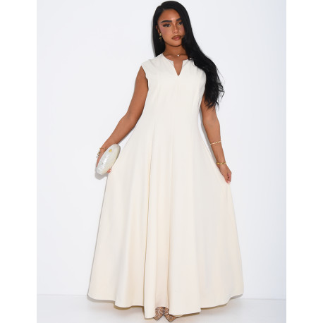 Ensemble robe sans manche évasée et cape plissée à broche