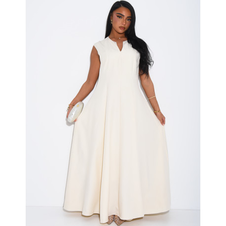 Ensemble robe sans manche évasée et cape plissée à broche