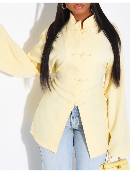 Blouse col montant à attaches qui se noue dans le dos