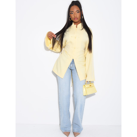 Blouse col montant à attaches qui se noue dans le dos