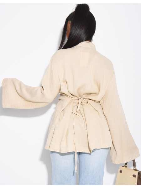 High-neck blouse with ties that fasten at the back