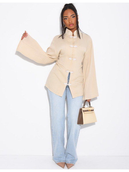 High-neck blouse with ties that fasten at the back