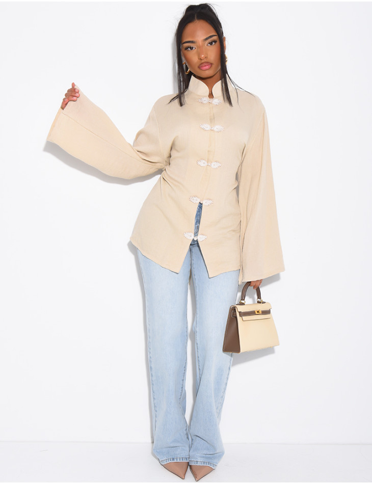 High-neck blouse with ties that fasten at the back