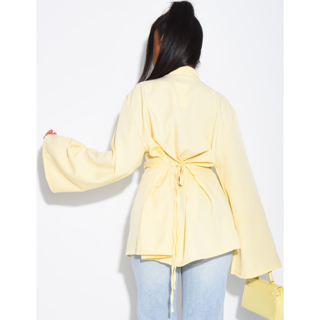 Blouse col montant à attaches qui se noue dans le dos
