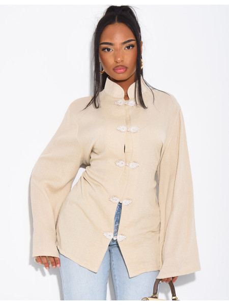 High-neck blouse with ties that fasten at the back