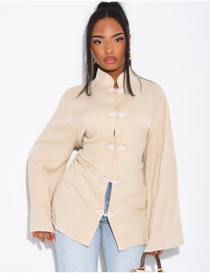 High-neck blouse with ties that fasten at the back