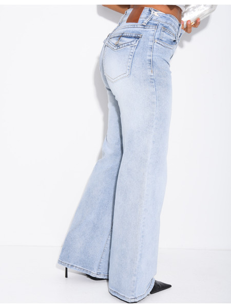 Jeans taille basse wide leg à poches rabattues