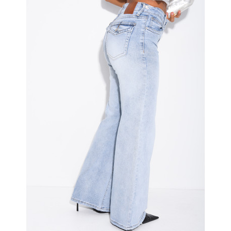 Jeans taille basse wide leg à poches rabattues