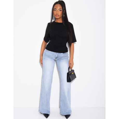 Jeans taille basse wide leg à poches rabattues