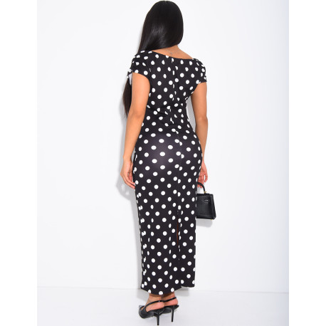 Long, figure-hugging polka dot dress