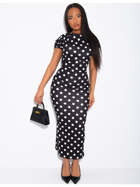 Long, figure-hugging polka dot dress