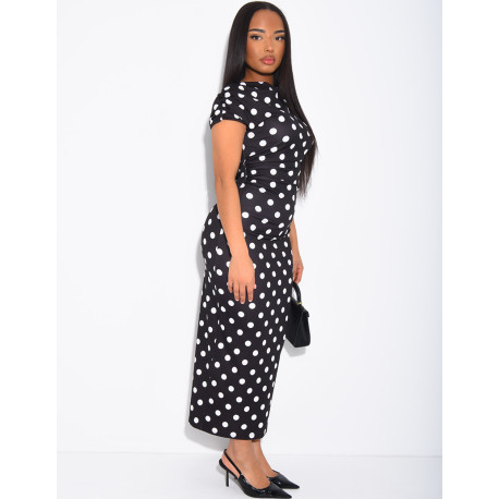 Long, figure-hugging polka dot dress