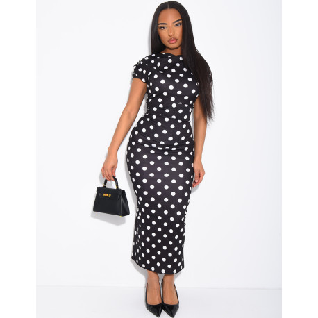 Long, figure-hugging polka dot dress