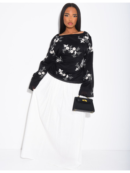 Embroidered blouse with a tie at the back