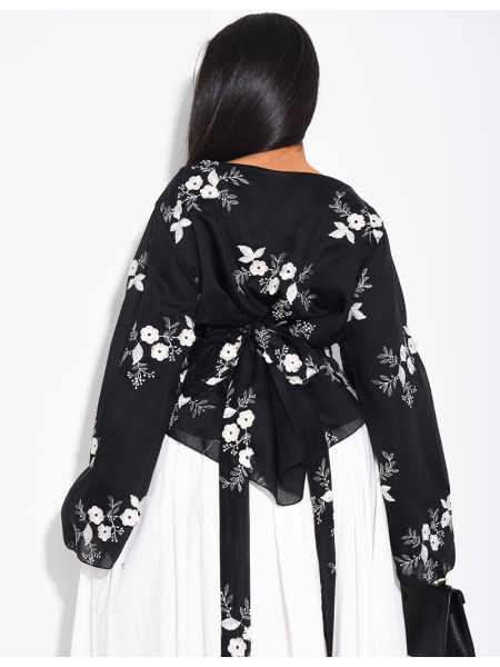 Embroidered blouse with a tie at the back