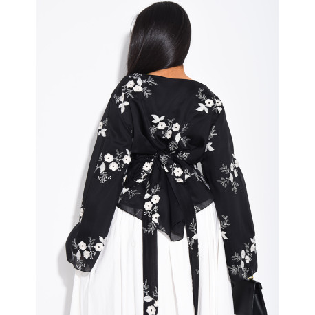 Embroidered blouse with a tie at the back