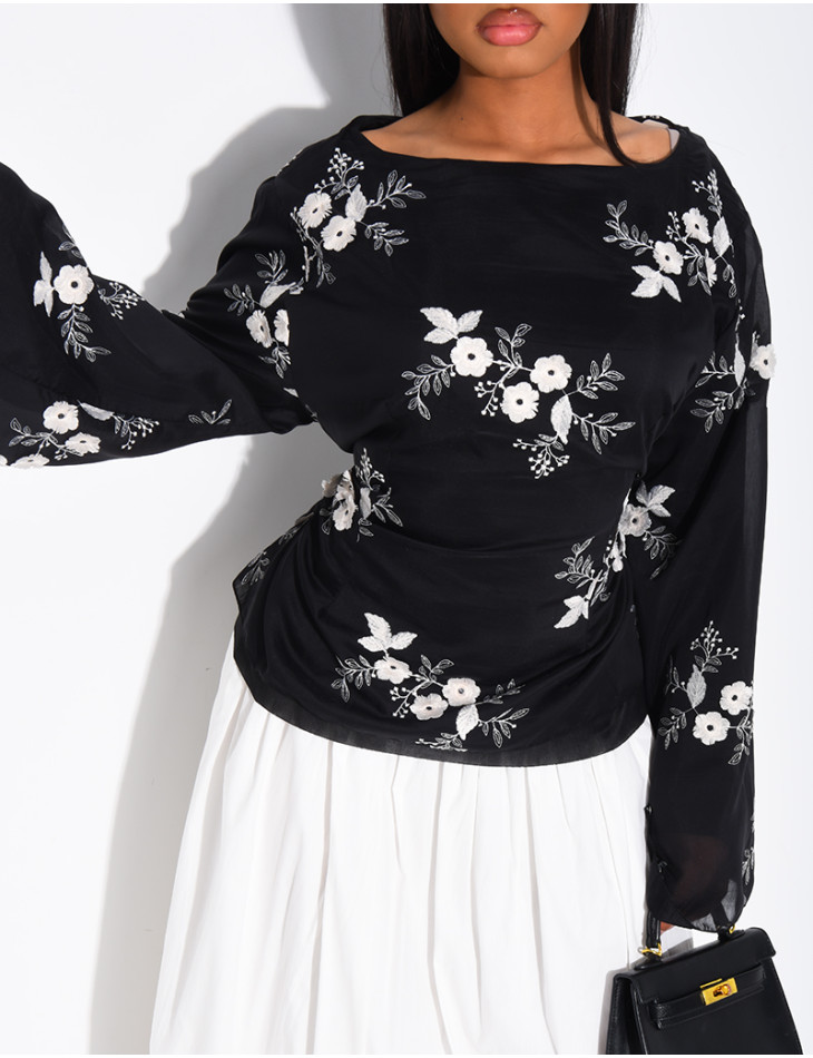 Embroidered blouse with a tie at the back