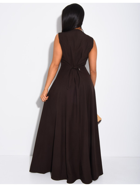 Long, sleeveless button-up dress with a tie at the back