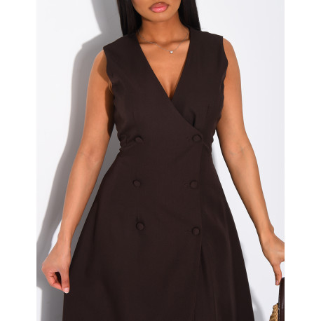 Long, sleeveless button-up dress with a tie at the back