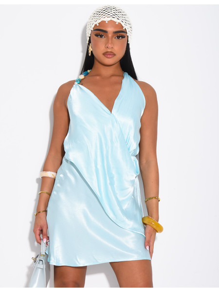 Short backless dress in satin with colorful beads