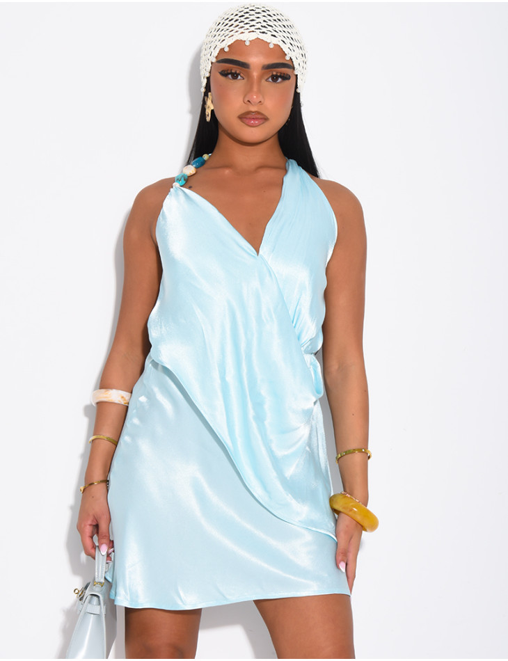 Short backless dress in satin with colorful beads