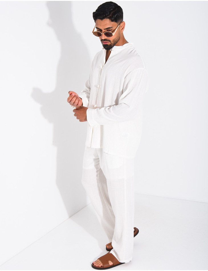 Linen set comprising trousers and a round-neck shirt