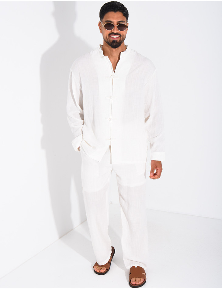 Linen set comprising trousers and a round-neck shirt