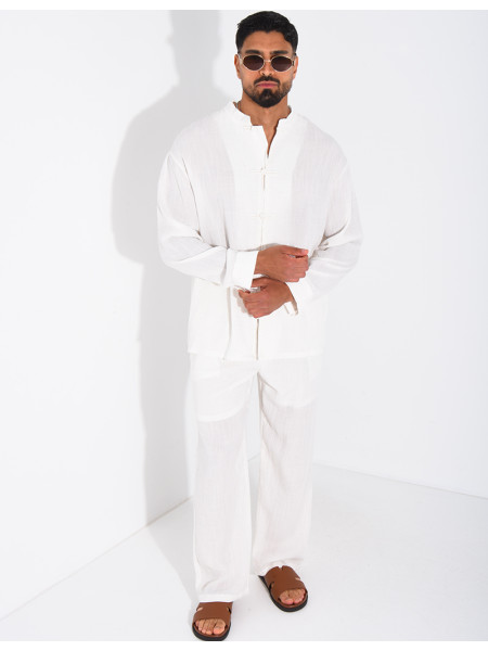 Linen set comprising trousers and a round-neck shirt