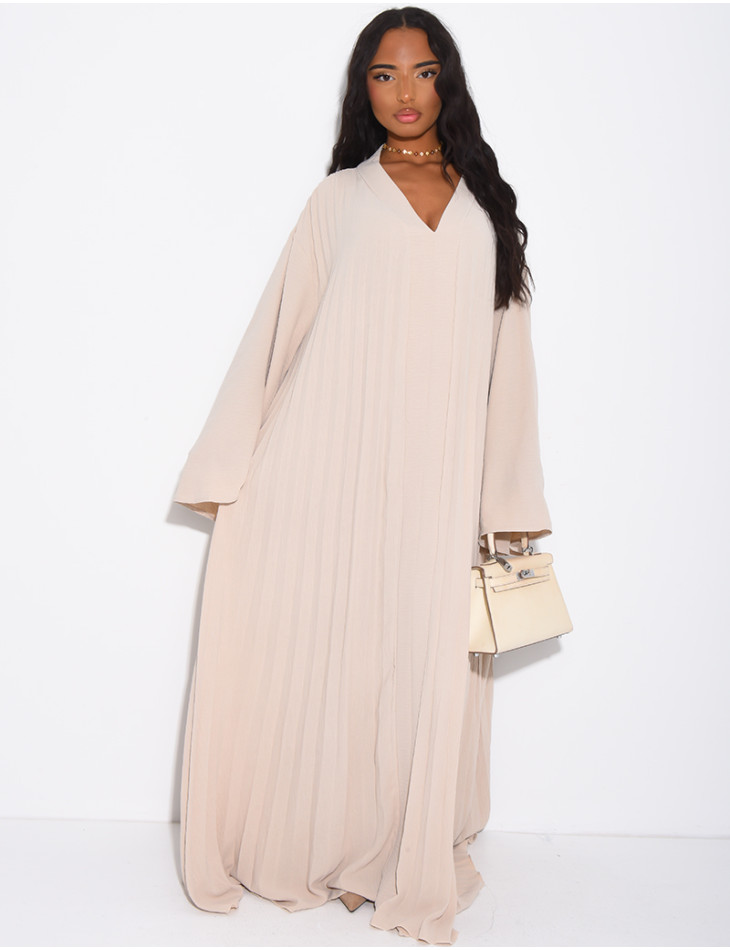 Long, loose-fitting pleated dress