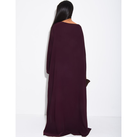 Satin set with gathered top and pants, featuring a cape