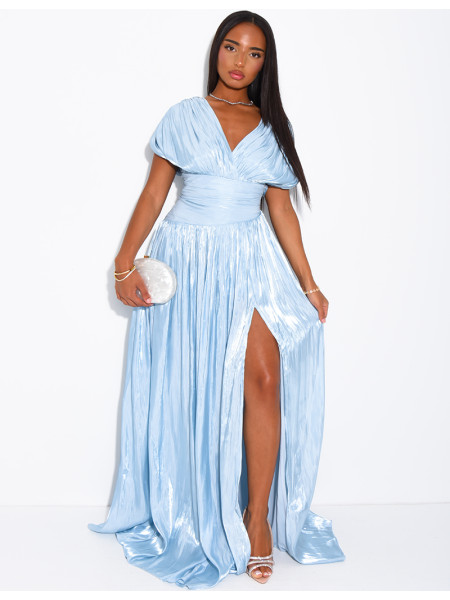 Long, backless dress in iridescent satin with a slit