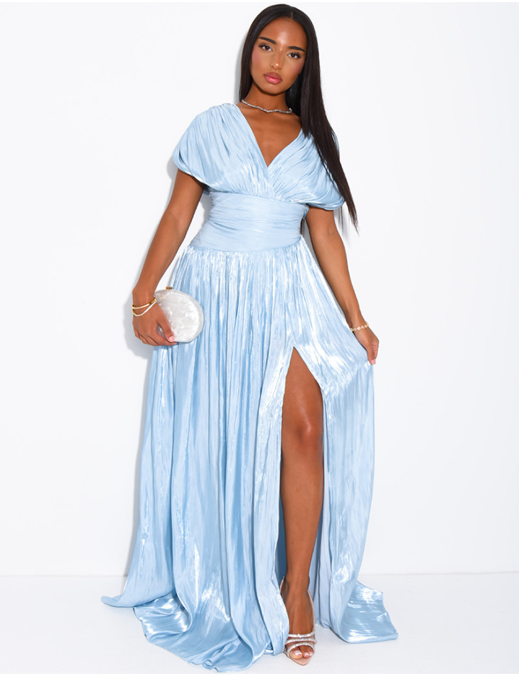 Long, backless dress in iridescent satin with a slit