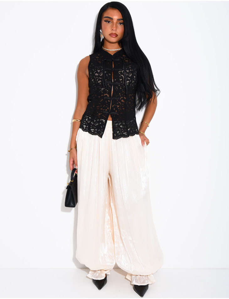 Sleeveless lace top with Asian-style ties