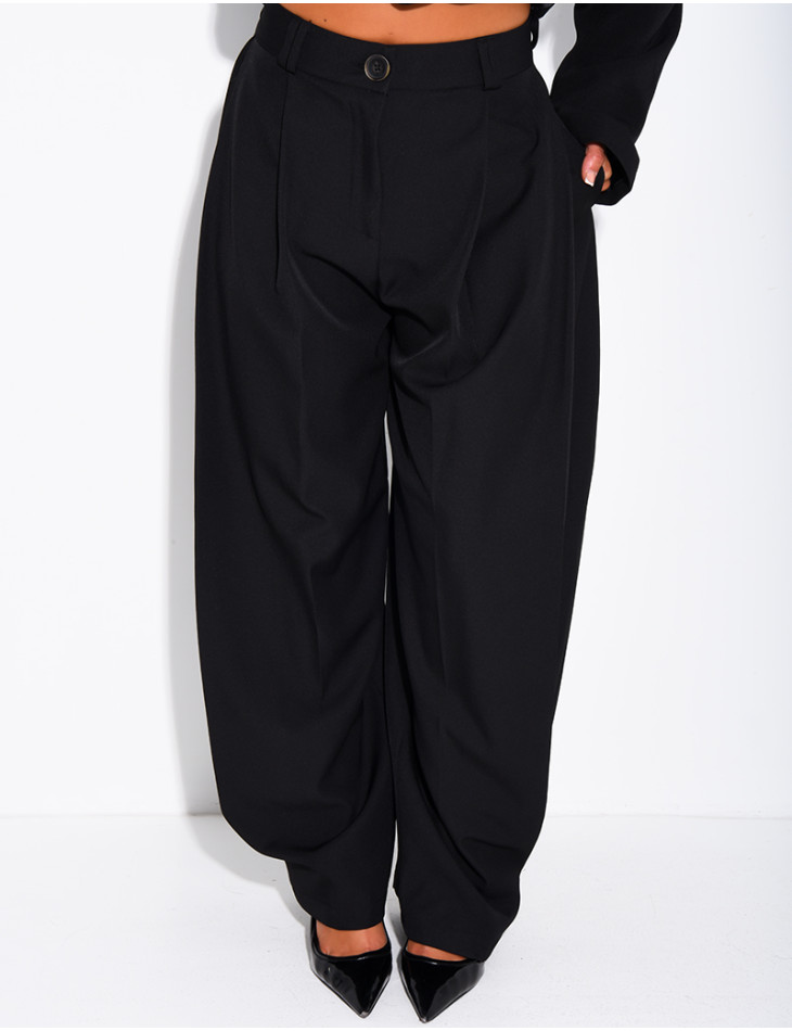 Flared tailored pants with buttons at the ankles