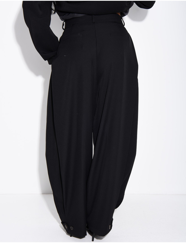 Flared tailored pants with buttons at the ankles