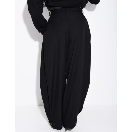 Flared tailored pants with buttons at the ankles