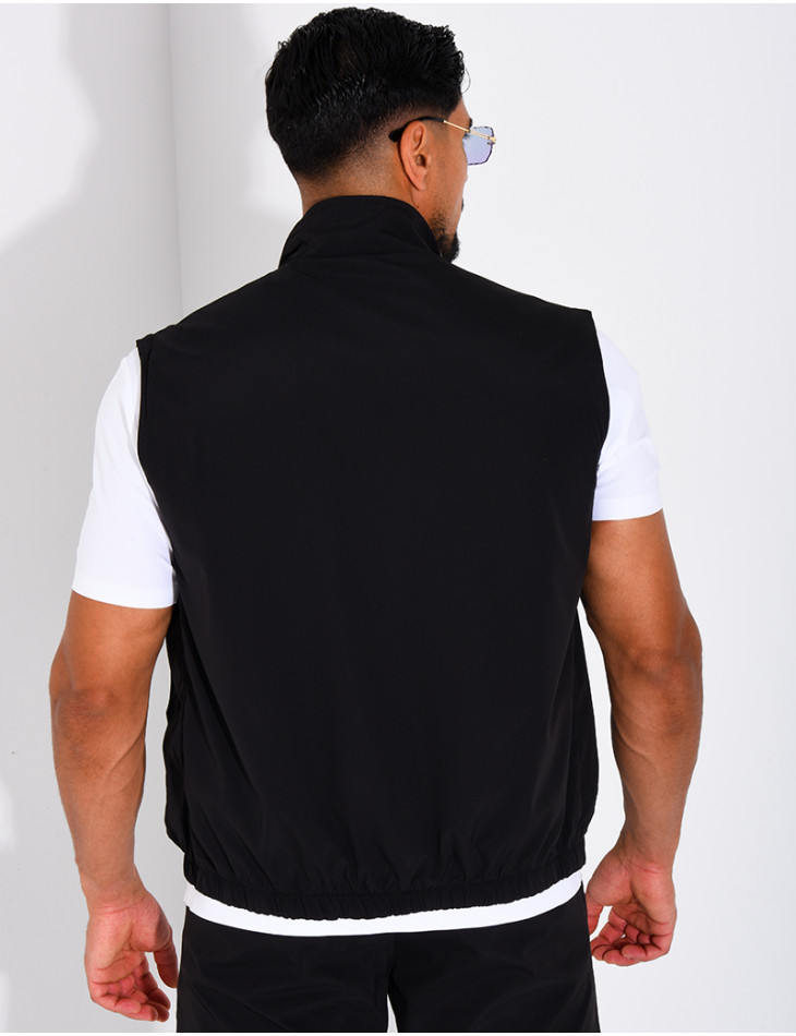 Reversible sleeveless jacket