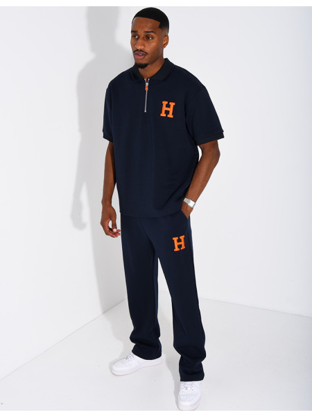 Set aus Hose und Polohemd mit dem Buchstaben H