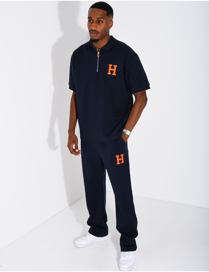 Set aus Hose und Polohemd mit dem Buchstaben H