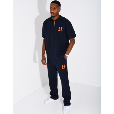 Set aus Hose und Polohemd mit dem Buchstaben H