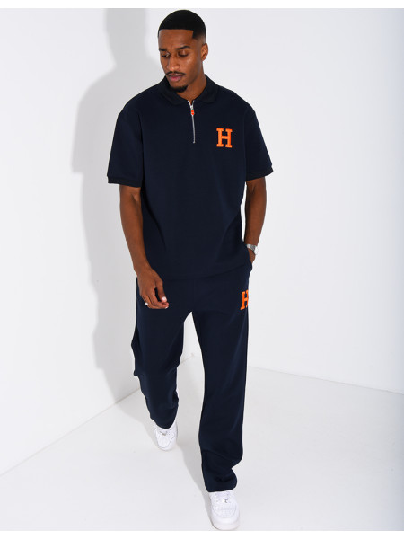 Set aus Hose und Polohemd mit dem Buchstaben H