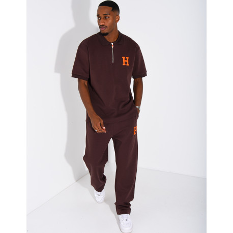 Set aus Hose und Polohemd mit dem Buchstaben H