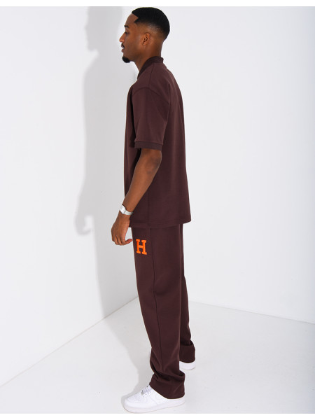 Set aus Hose und Polohemd mit dem Buchstaben H