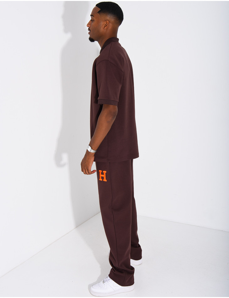 Set aus Hose und Polohemd mit dem Buchstaben H