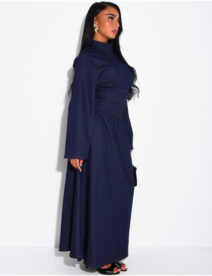 Long denim dress with a high neckline and a tie-back detail