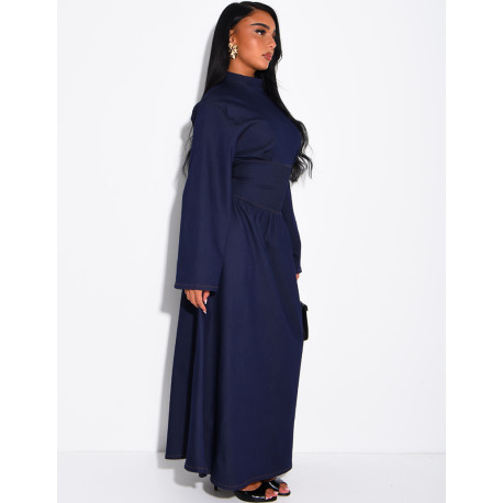 Long denim dress with a high neckline and a tie-back detail
