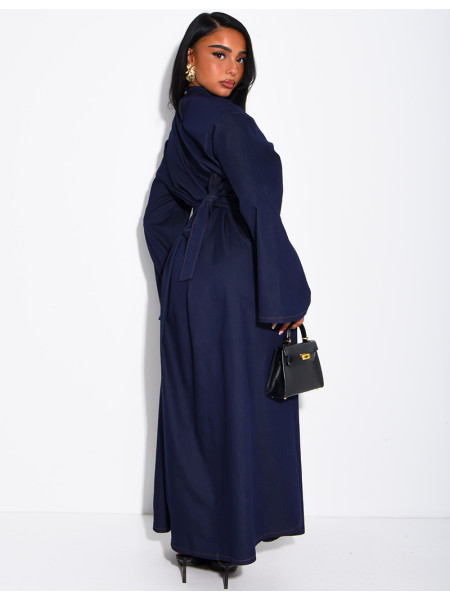 Long denim dress with a high neckline and a tie-back detail