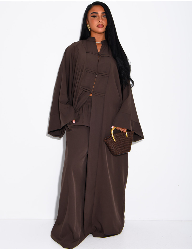 Set comprising trousers and a long tunic with Asian-style fastenings