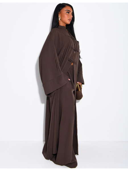 Set comprising trousers and a long tunic with Asian-style fastenings